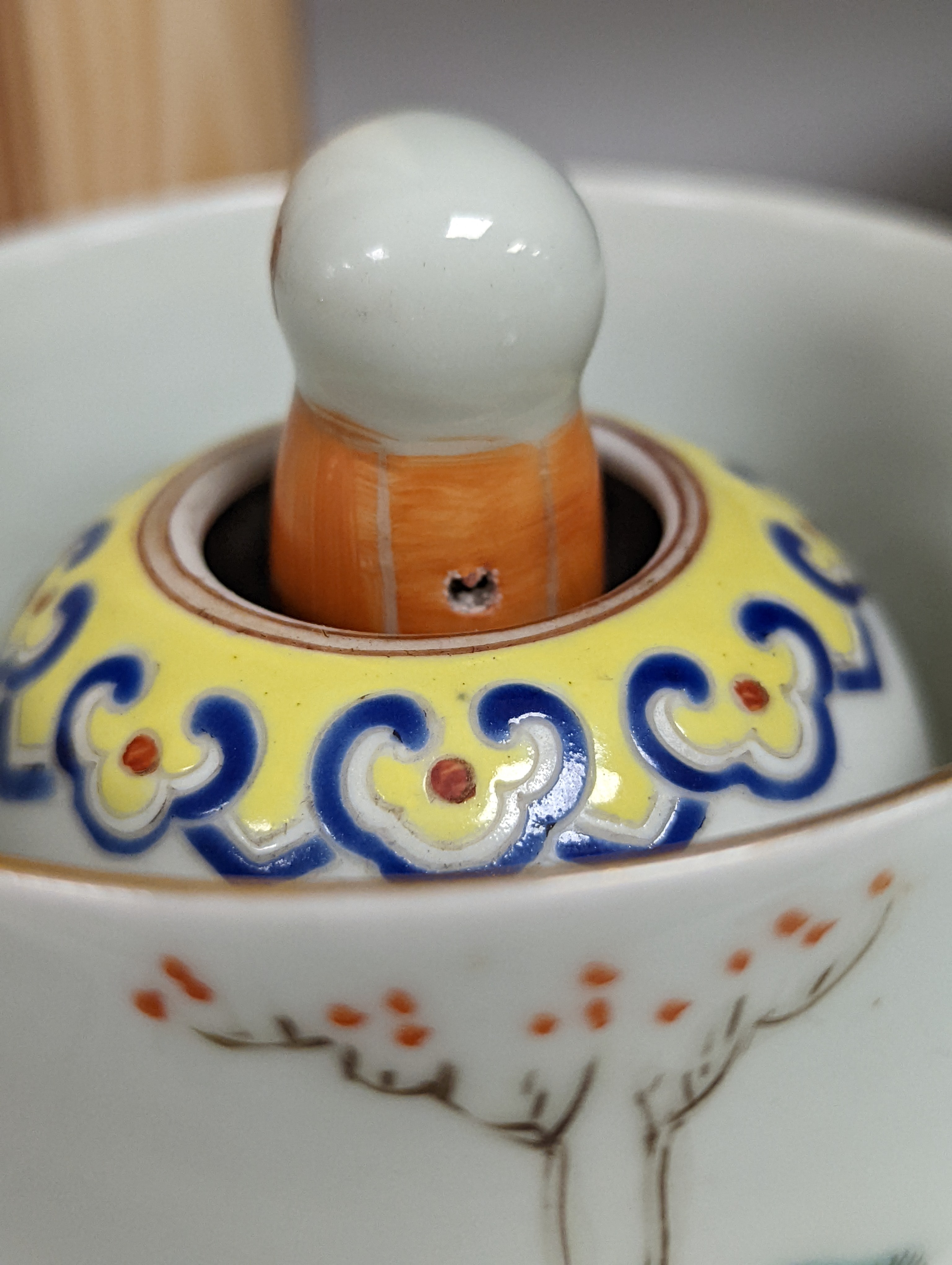 A Chinese famille rose puzzle cup, 8cm high